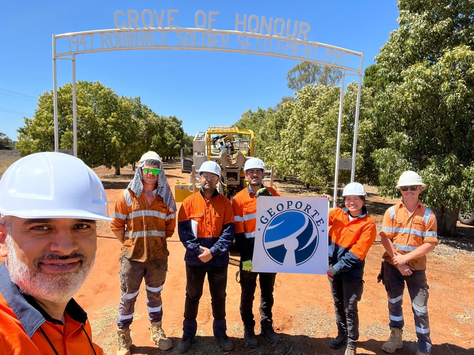 Robinvale site investigation team with the Geoporte sign
