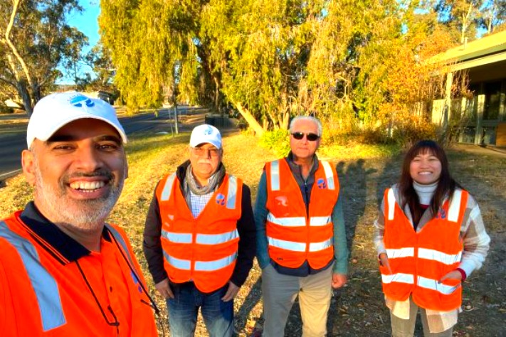 Geoporte engineers in hi-vis vests on a site visit