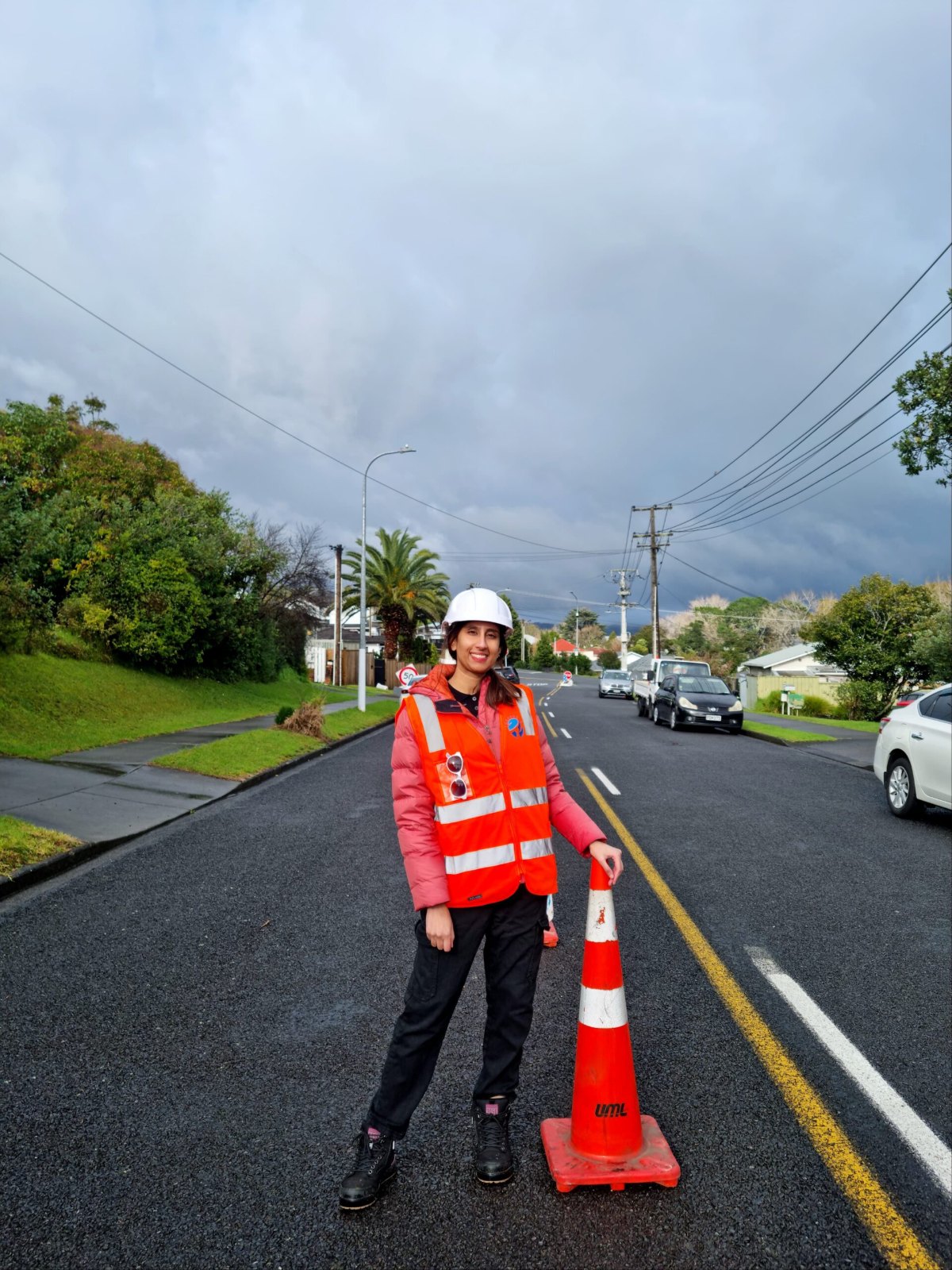 Geoporte engineer in hi-vis and hard hat on a street works site